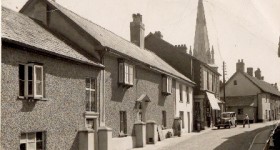 A post card showing Fore Street, Uffculme in Devon.